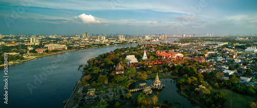 Fototapeta Naklejka Na Ścianę i Meble -  Aerial view of Nonthaburi, thailand. Skyline along Chaophraya River sunset.