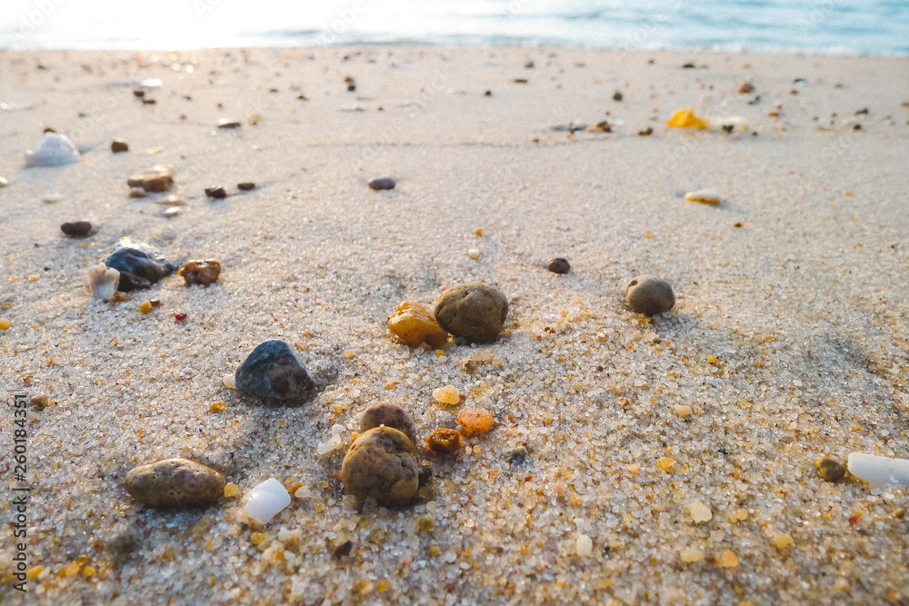 Sand background with little stones in morning.,Sandy texture with stones. ,copy space. Sand background with little stones in morning.,Sandy texture with stones. ,copy space.