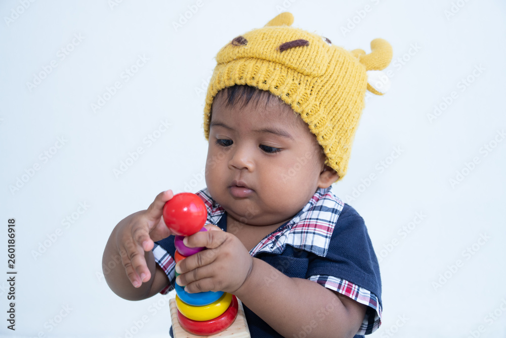 Cute little asian baby boy sitting and play toy Cute little asian baby boy sitting and play toy
