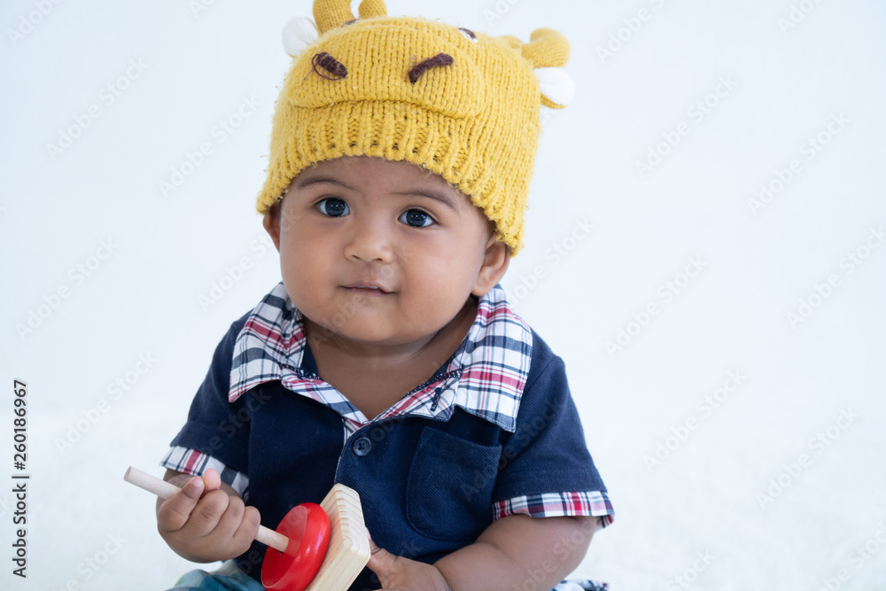 Cute little asian baby boy sitting and play toy Cute little asian baby boy sitting and play toy