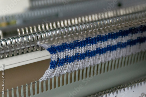 Manual knitting machine. A knitting machine is a device used to create knitted fabrics