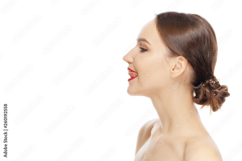Lovely girl looking away, standing in profile and lick her lips Lovely girl looking away, standing in profile and lick her lips
