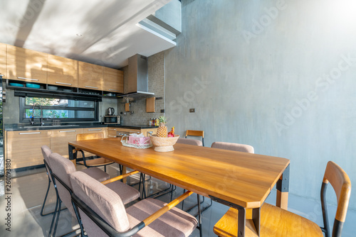 Luxury interior design in kitchen area with feature island counter and dining table