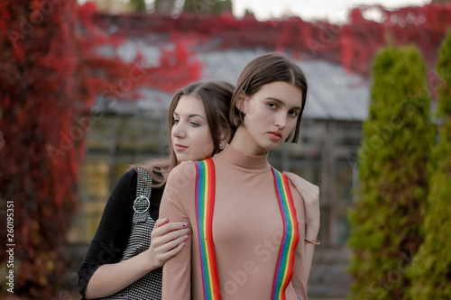 Photography Cute girl hugs his girlfriend tightly