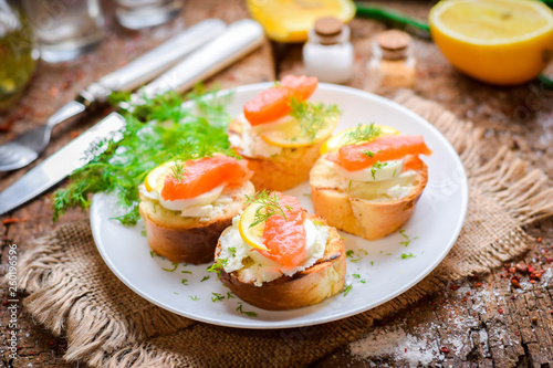 Baguette sandwich with egg and red fish.