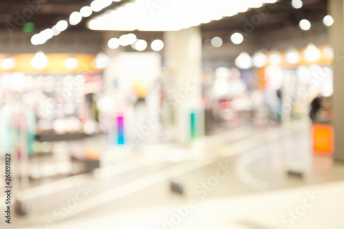 Blurred image of people in shopping mall with bokeh, vintage color