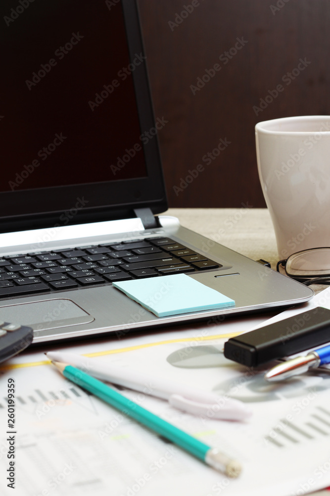 Business concept with a report, money and a calculator Business concept with a report, money and a calculator