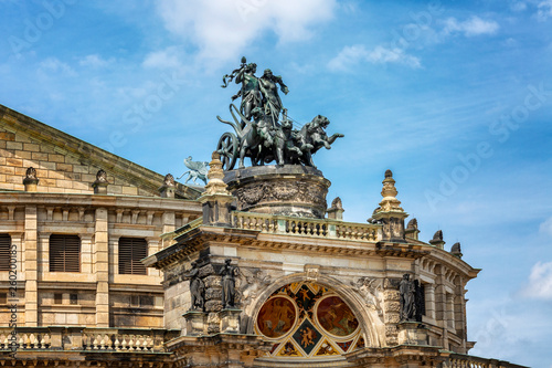 The architecture of the old town in Dresden on the background of bright blue sky. Close-up.