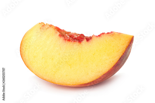 Peach fruit slice on white