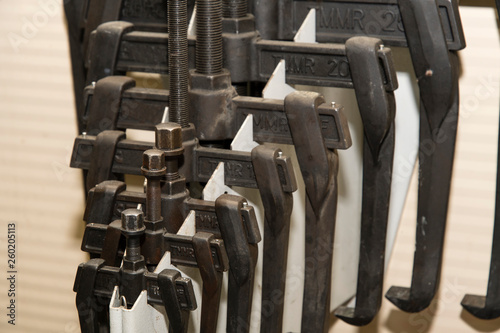 Detail of a set of metal bearing pullers.