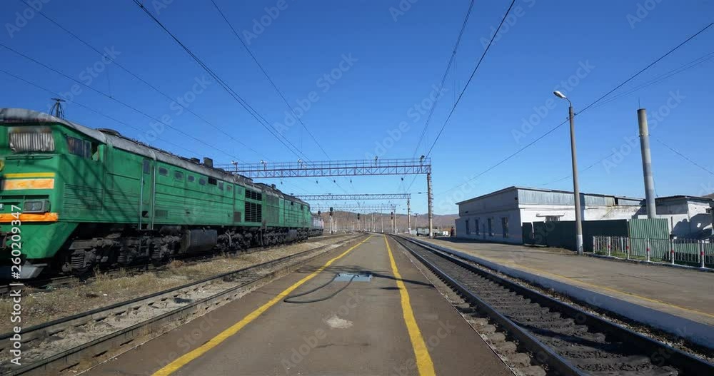 Platform of Trans Siberian with blue sky and electric pole Platform of Trans Siberian with blue sky and electric pole