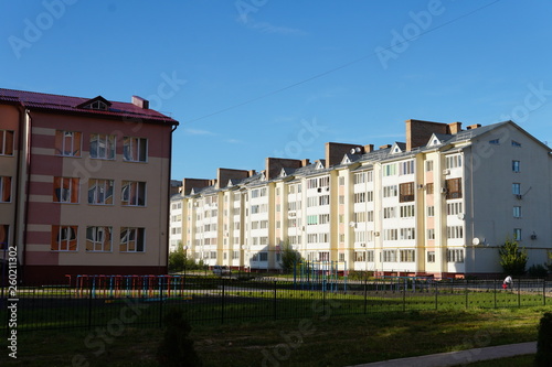 Modern condominium building real etate in city with blue sky photo