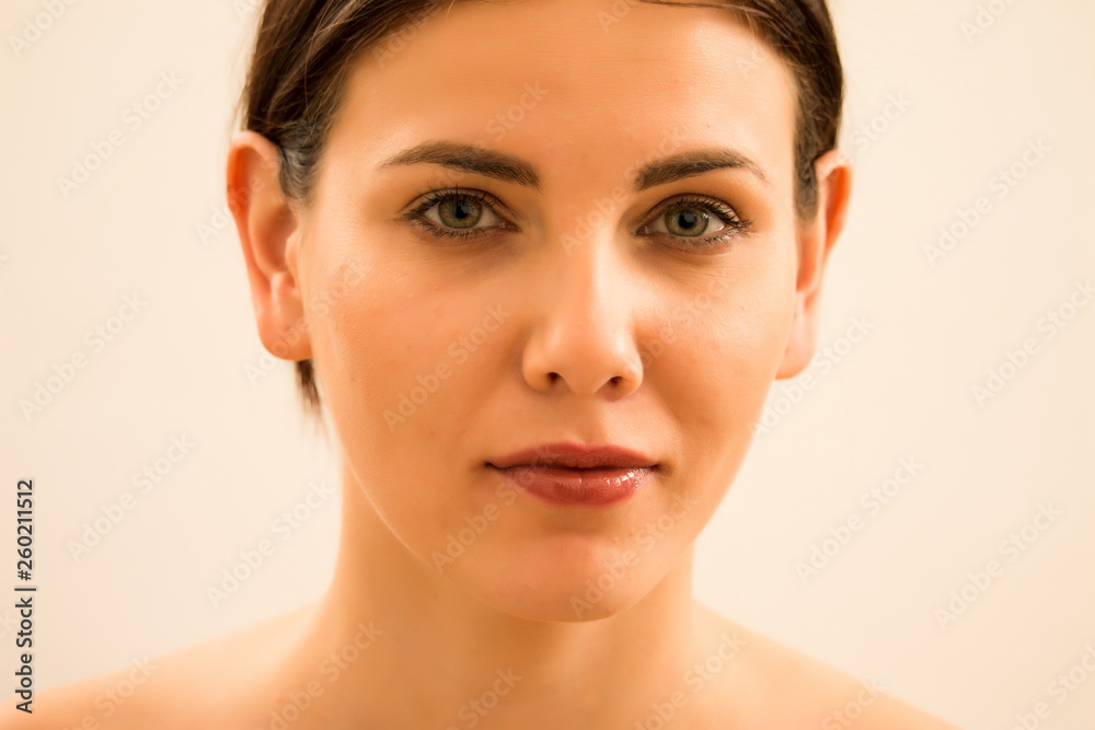 beautiful woman face close up natural beauty, cosmetics, wellness and skin care concept