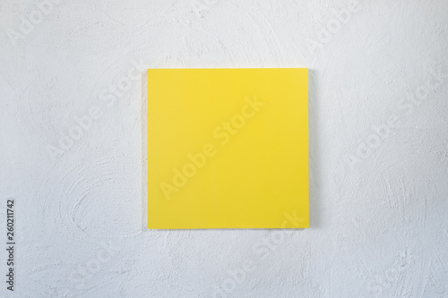 Blank yellow board on white background photo