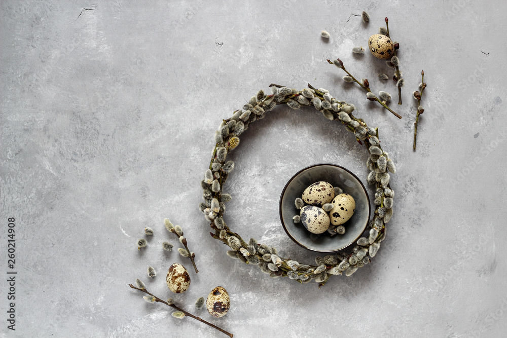 Quail eggs and pussy willow wreath as a symbols of spring and Easter, with a copy space Quail eggs and pussy willow wreath as a symbols of spring and Easter, with a copy space