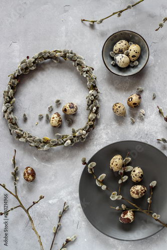Quail eggs and pussy willow wreath as a symbols of spring and Easter