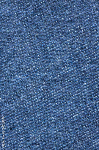 Texture of old blue jeans for background.