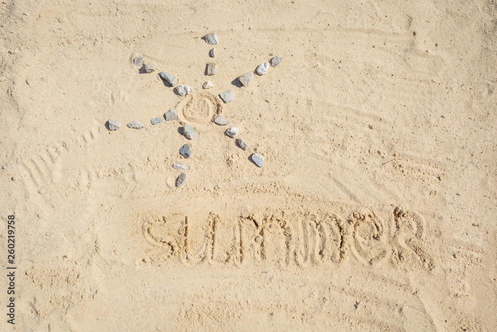Fototapeta premium Top view of summer sand child drawing