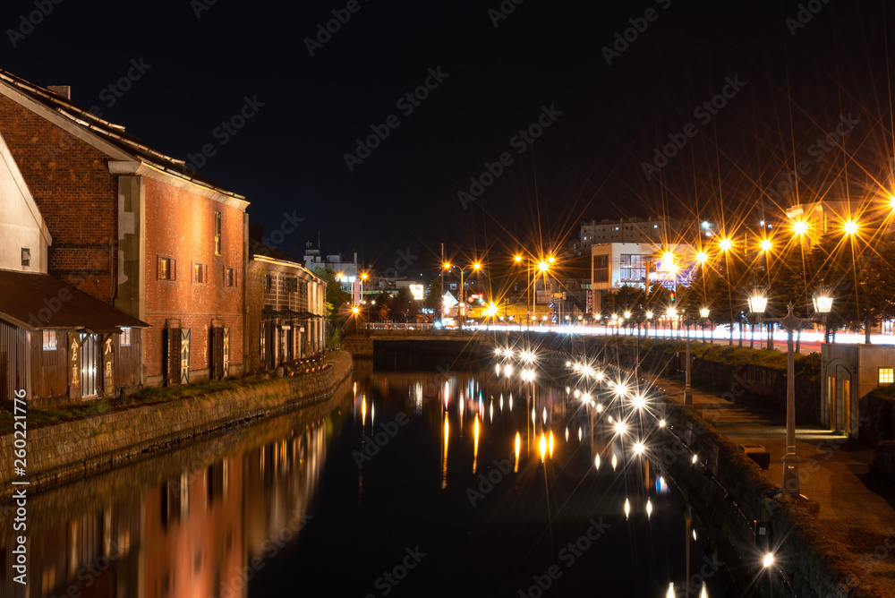 Landscape view of Otaru canals and warehouse at night in Hokkaido Japan. Here is a famous landmark of Otaru city.