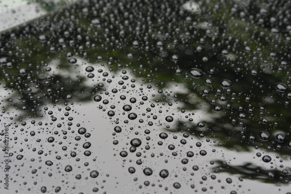 water rain drop on black modern vehicle car with glass coating glossy water rain drop on black modern vehicle car with glass coating glossy
