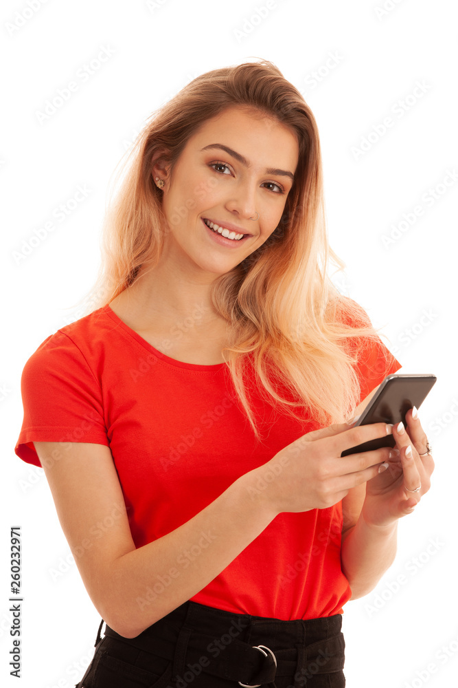 Beutiful young woman texting message on a smartphone isolated over white background Beutiful young woman texting message on a smartphone isolated over white background