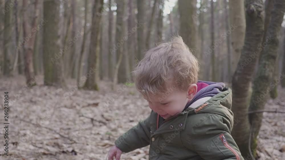 Small boy running in the forest, laughing and playing hd Small boy running in the forest, laughing and playing hd