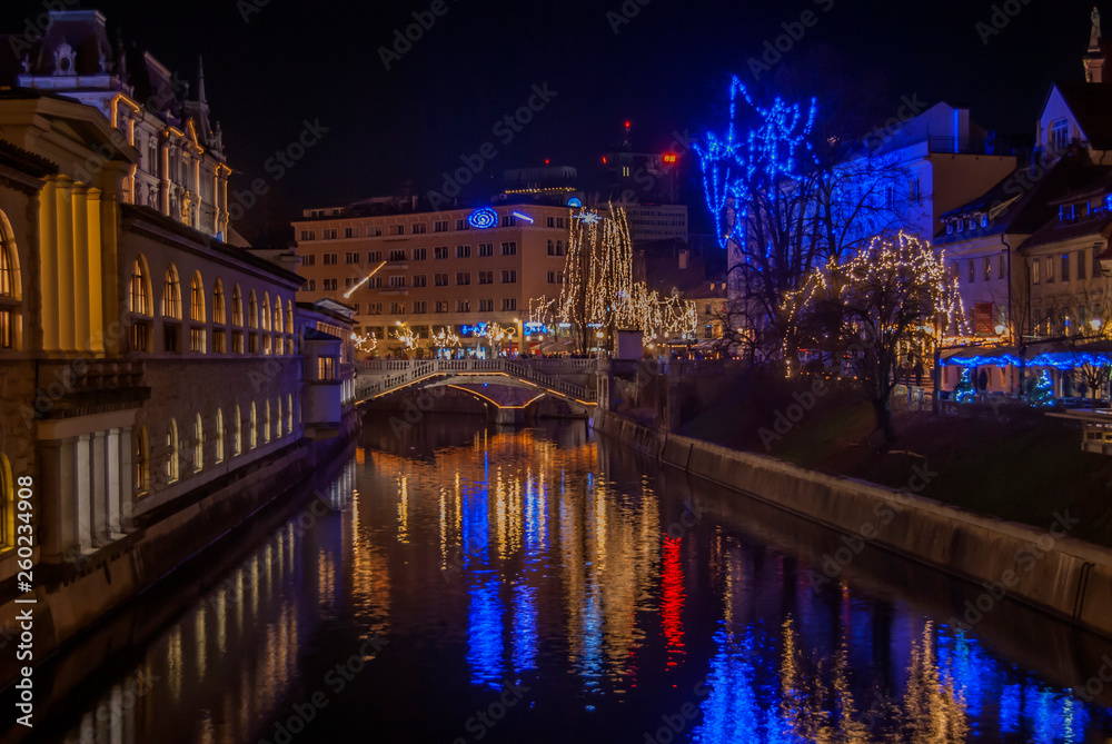 LJUBLJANA, SLOVENIA, 2018.12.24: New years decorations in city center at night.