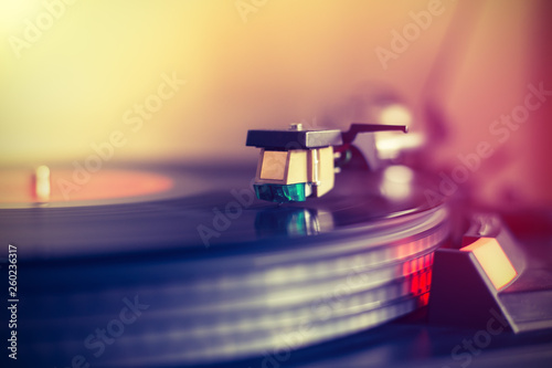 Playing retro music: Professional turn able audio vinyl record music player. Sunbeam. © Patrick Daxenbichler