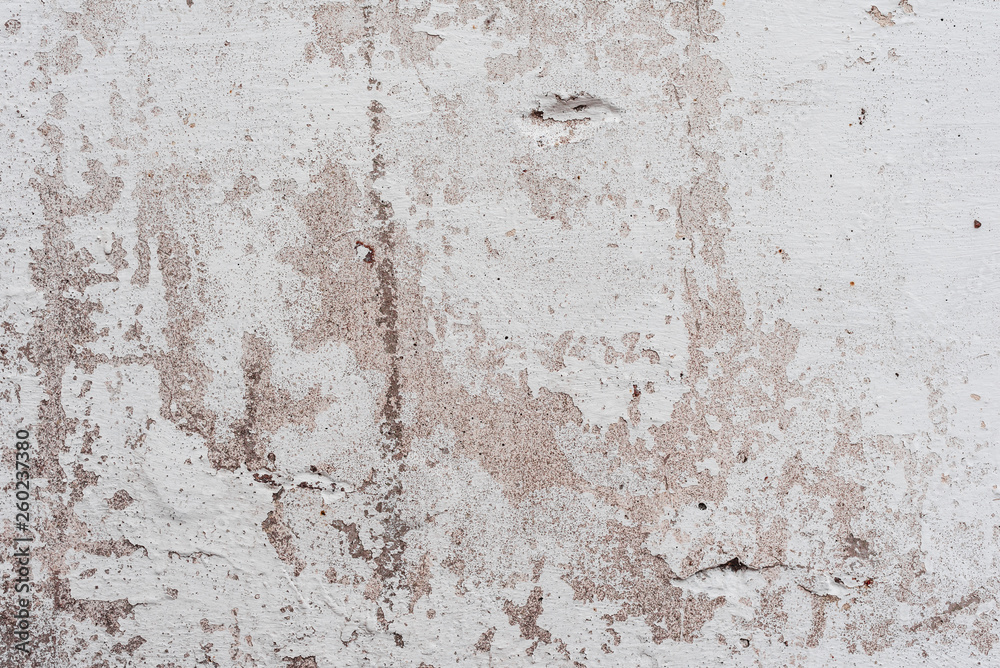 Fototapeta premium Wall fragment with scratches and cracks