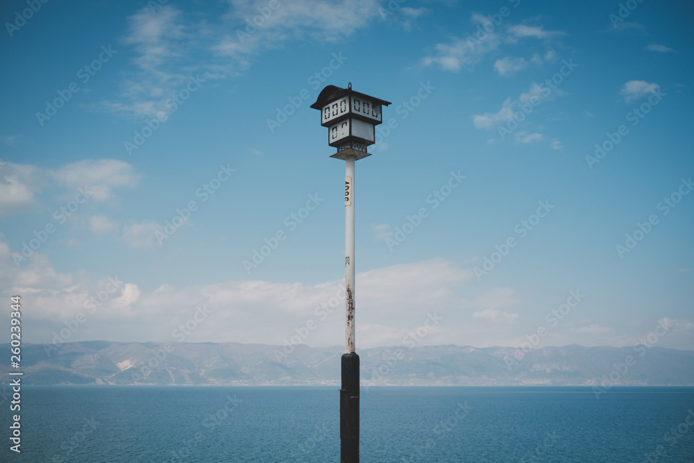 street lamp on background of a lake