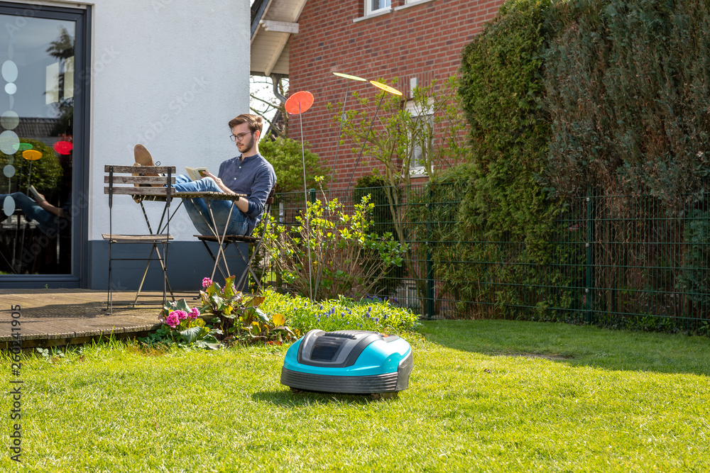 Mähroboter für den Garten Stock Photo Adobe Stock