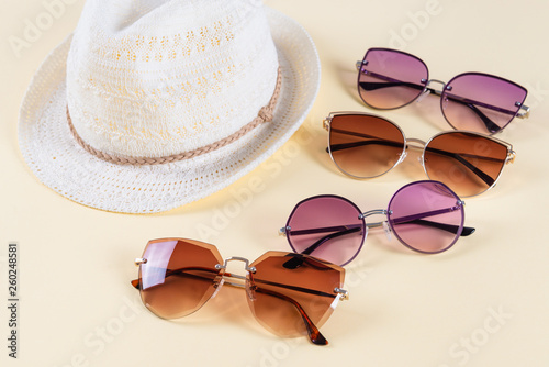 Summer accessories and fashion, Set of sunglasses and straw hats, Different type of style comparison. Summer season