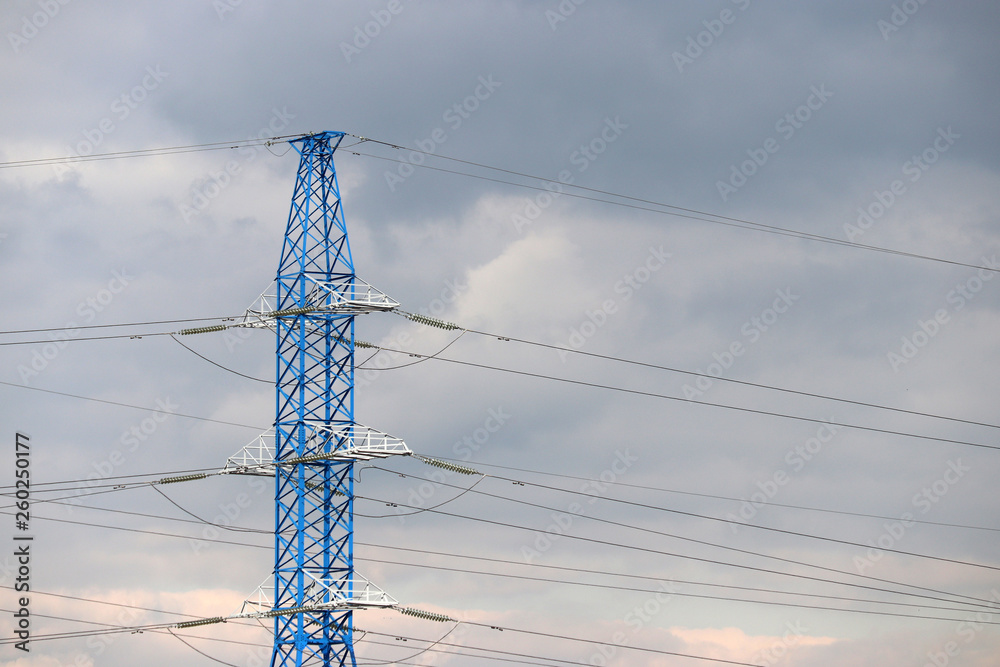 High voltage power line post with electrical wires and capacitors on ...