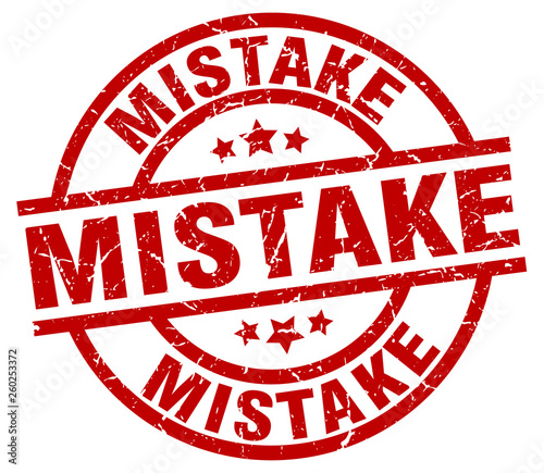 mistake round red grunge stamp