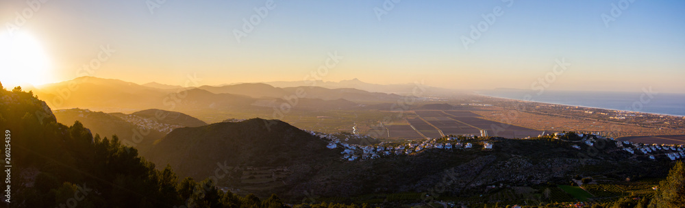 Obraz premium Panoramic view of Marjal wetland narural park in Pego, Spain, at sunset. View from Segaria mountain.