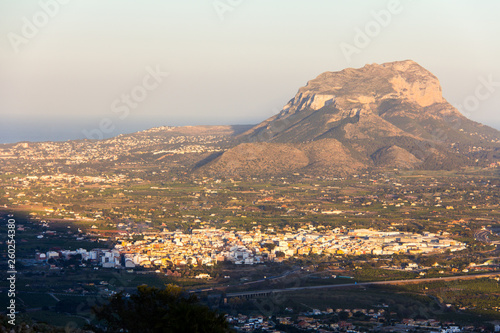 Panoramic view of Ondara and Denia cities and Montgo mountain, view from Segaria mountain at sunset. photo
