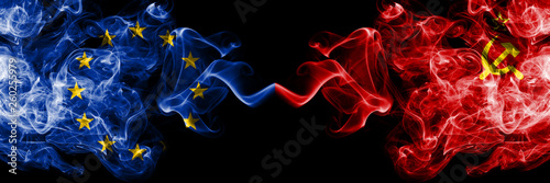European Union vs USSR, Communist smoke flags placed side by side. Thick colored silky smoke flags of EU and USSR, Communist