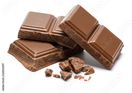 Slika na platnu Milk organic chocolate pieces isolated on white background