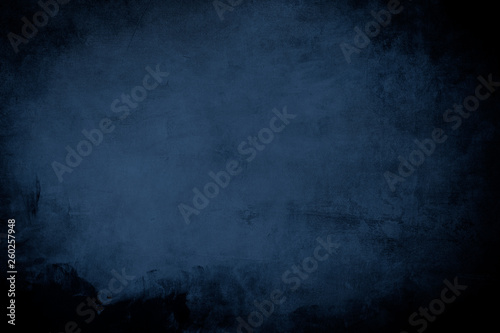Dark blue grungy background or texture