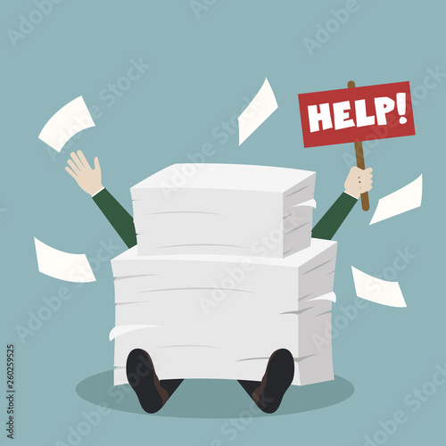 Businessman needs help under a lot of documents and holding a HELP placard. photo