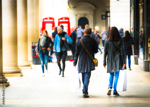 People walking on London shopping street- defocused with motion blur