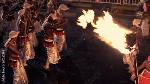Editorial Kandy, Sri Lanka - 07.7.2016: Whip-cracker perform dance through the streets of Kandy in Sri Lanka during the Esala Perahera