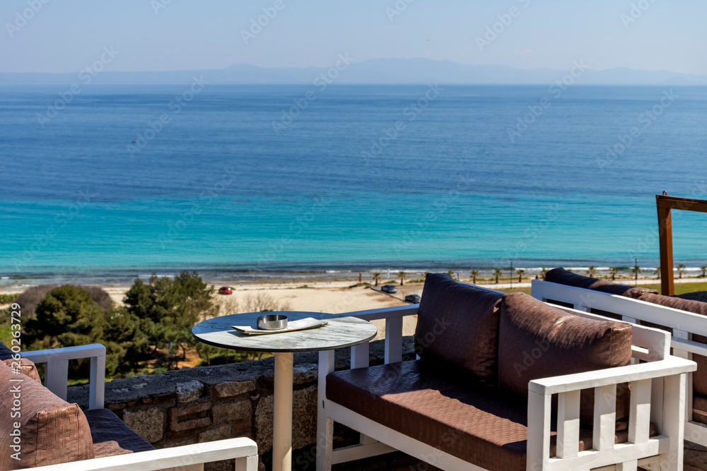 Typical Greek Restaurant at the coastline of town of Afytos, Kassandra, Chalkidiki, Central Macedonia, Greece