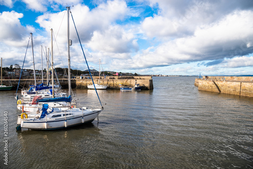 Sailboats anchored in a Harbour on a Sunny Autumn Day photo