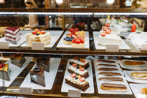 glass showcase with a variety of pastries in the restaurant