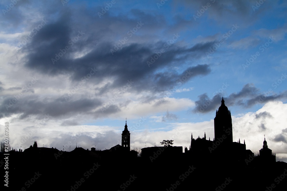 Old town silhouette with clouds