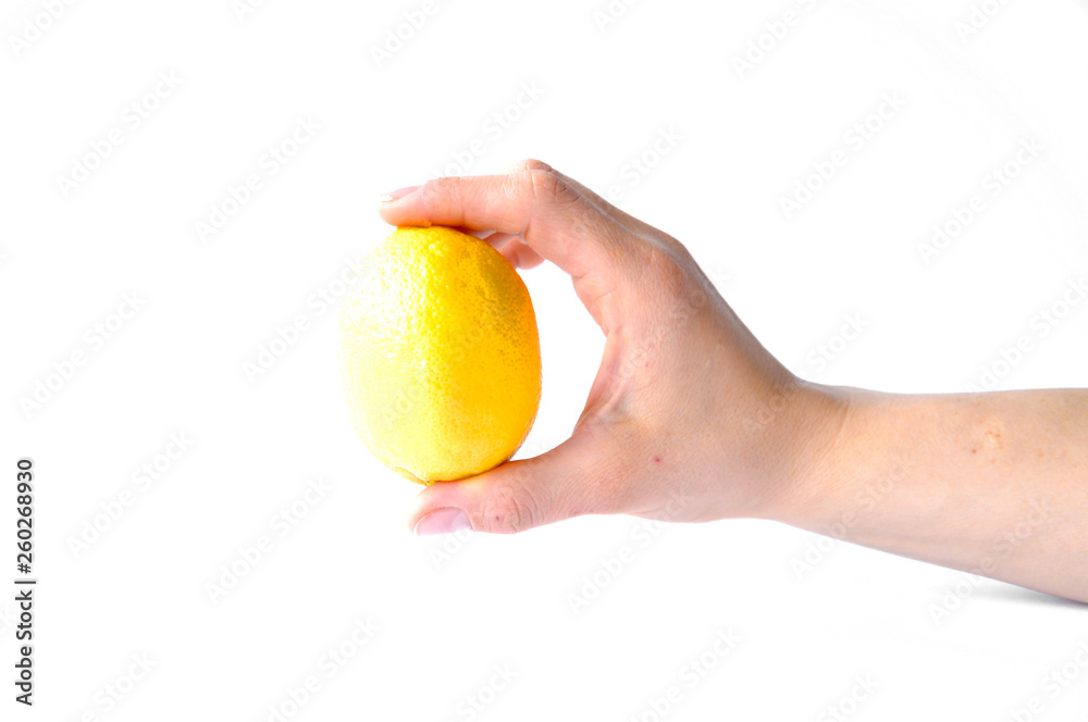 lemon in hand on white background lemon in hand on white background