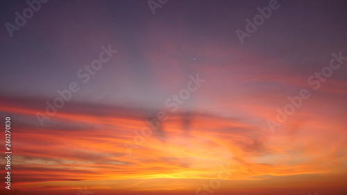 Fototapeta Naklejka Na Ścianę i Meble -  Beautiful sky with golden clouds in the west.Time Lapse
