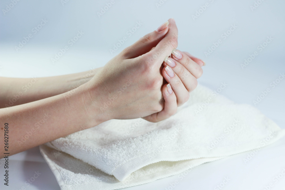 beautiful hands of a girl cream white background beautiful hands of a girl cream white background
