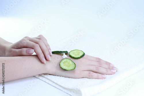 hands of a woman cream cucumber